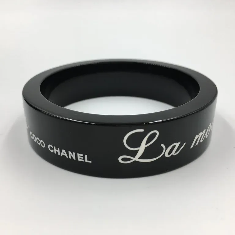 Chanel Black Logo Bangle - La Mode se Demode. Le Style Jamais Coco Chanel